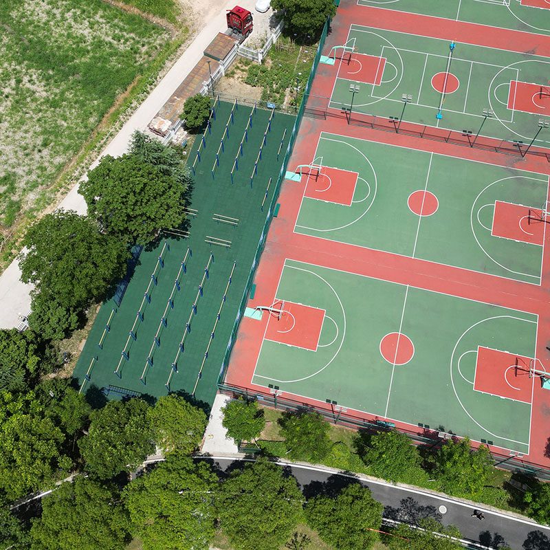 A Middle School Sports Field-Dyed Rubber Tile