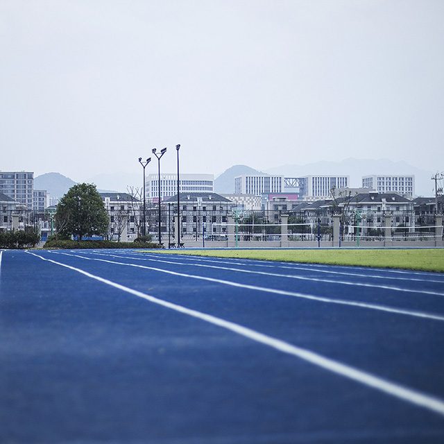 Mixed-type athletic track thumb 2